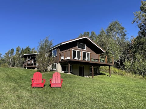 Front of the cabin as seen from the lawn in late summer.