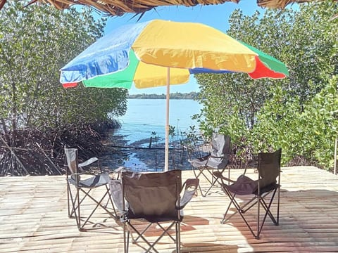 Relax with your family and friends on a deck in front of the ocean view. Feel the cool breeze from the ocean and sorrounding mangrove trees.