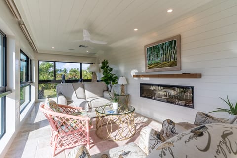 Sitting Area with Fireplace and Lagoon Views