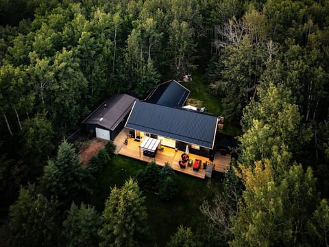 Tucked among mature trees, Aspen Acre feels wonderfully private while giving you plenty of room to relax, gather, and enjoy the outdoors.