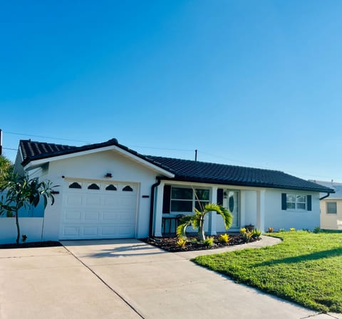 Front of the house with 2 parking in driveway