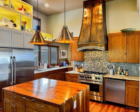 The kitchen: BlueStar range and hand-built copper hood