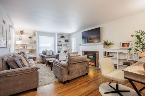 Living Room with TV and fireplace