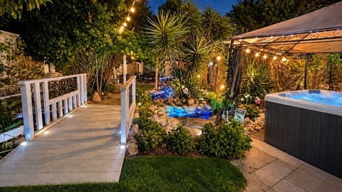 The Koi Ponds Retreat is unlike any other, with so many scenes to explore and photo opps, it’s an attraction all its own!  Enjoy the beautiful ponds & NEW 6-Person Hot Tub with Waterfall, Lounger, Lights & Jets (*+ Fee).