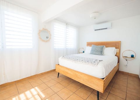 Bedroom with A/C and Queen bed.