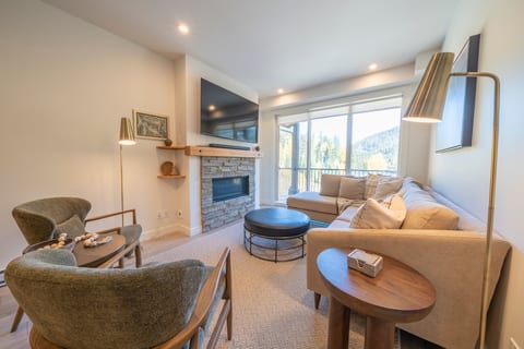 Unwind in style. Crisp natural light, thoughtful textures, and glowing fireside ambiance make this the ultimate space to kick back and recharge.