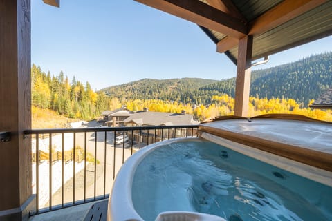 Soak in pure mountain tranquility. Unwind beneath a covered timber overhang while taking in stunning views of Morrisey Mountain and Back In Time.
