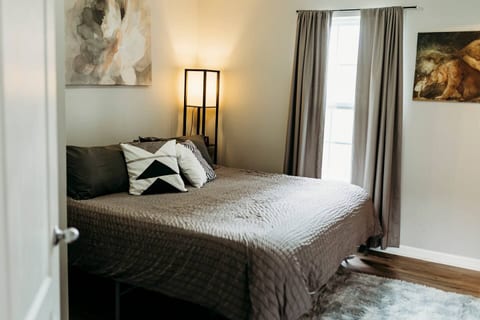 Jumping down to the lower floor, the second suite features a king bed with memory foam mattress.  