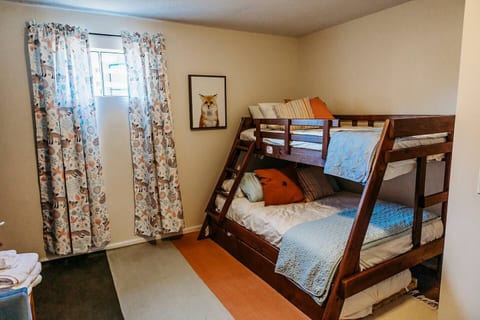 The "Forest Room" has been a big hit so far!  Mainly set up as a kid space, it contains a twin over full bunk bed, a trundle, kids’ books, and toys.  