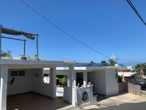 Street view of the property. This listing is for the second casita seen here. It has solar panels on the roof.