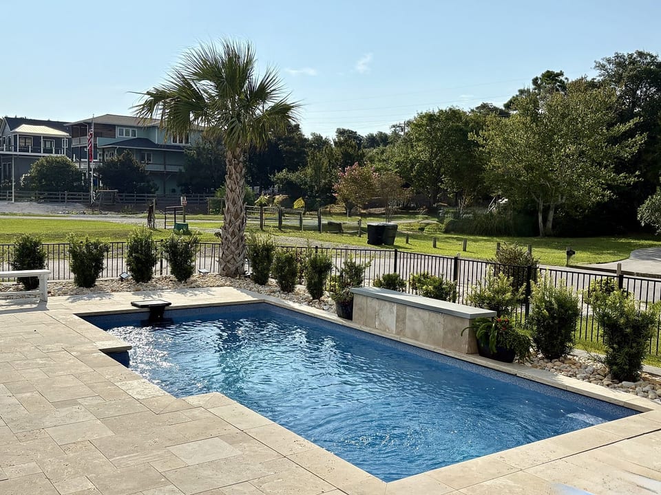 Spend your days relaxing by the private saltwater pool-the perfect Emerald Isle escape.