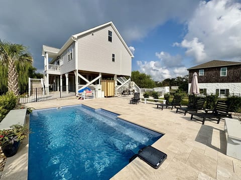Private saltwater pool surrounded by coastal breezes - your own Emerald Isle oasis