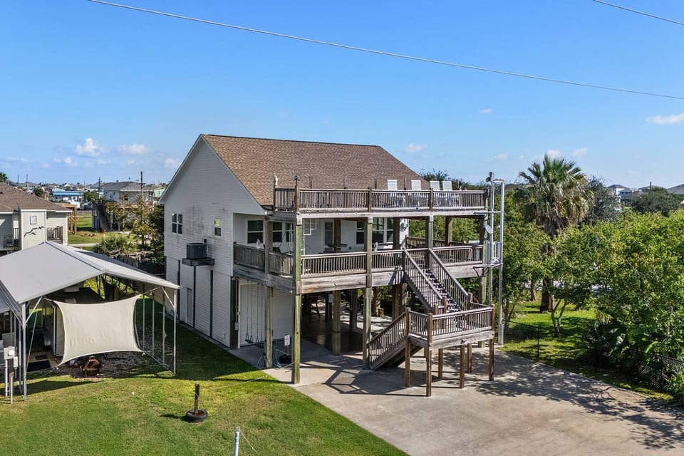 Raised beach house with decks on three levels