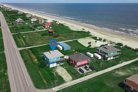 Aerial view: the house sits just steps from the beach