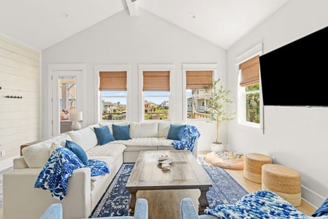 Sunny living room with windows on three sides