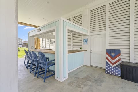Downstairs tiki bar with seating for four