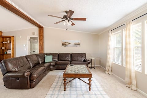 Living room with a big leather sectional