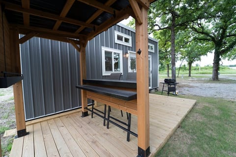 Covered bar-height patio for morning coffee