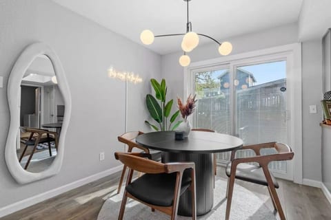 Round dining table with sliding doors to the patio