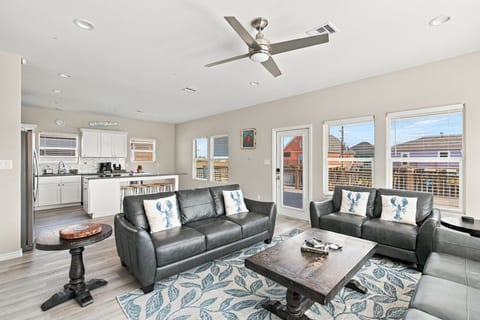 Open living room flowing into the kitchen
