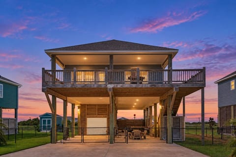 Twilight glow on the covered deck and patio below