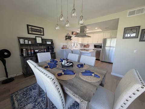 Dedicated dining space, open modern kitchen and coffee & tea bar.