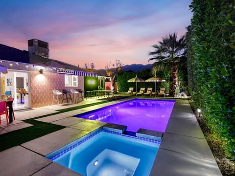 Enjoy a private pool, spa, ping pong, lounge chairs, twinkling string lights, mountain views, an outdoor bar, fire pit, BBQ, dining table, and plenty of seating. Relax, play, and unwind in your own Palm Springs oasis.