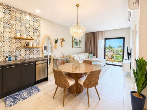 The open-plan kitchen, dining and living area leads onto your private balcony.