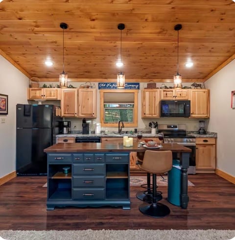 Rustic-chic kitchen with island seating and warm wood finishes