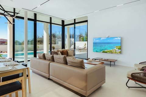 Designed for families and groups of up to 8, the villa combines resort-style bedrooms, spacious indoor-outdoor living and one of Aruba's most desirable locations.