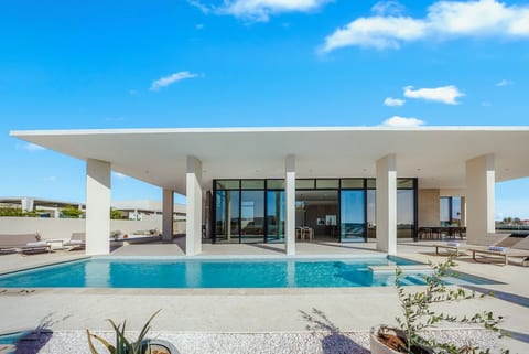 Stay at this new super contemporary 4-bedroom luxury villa with private pool in the prestigious Tierra del Sol resort.