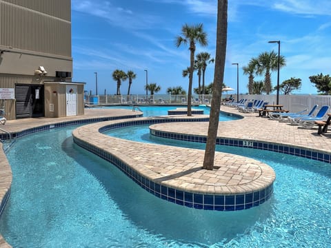 Enjoy oceanfront water amenities including a pool, lazy river, and kiddie splash pool.