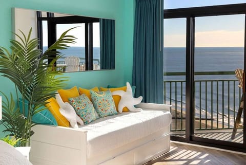 Twin daybed with a twin trundle bed, offering extra sleeping space and a cozy place to relax while enjoying the gorgeous scenery.