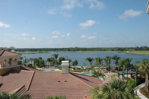 Lake and poolview from the condo. Actual photo from the balcony.
