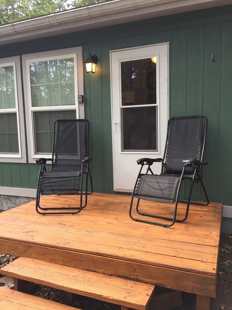 Front porch is great for relaxing surrounded by  nature, reading a book or star gazing.