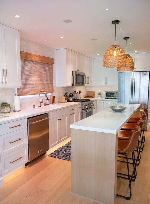 Fully-equipped chef's kitchen with an island and Keurig coffee bar—ideal for slow mornings or preparing family meals.