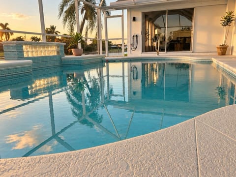 Spacious Waterfront Pool Home | Stunning Sunsets image 2