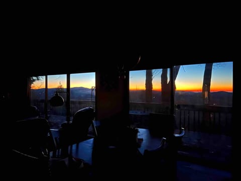 Full sunrise view from living area sliding doors.