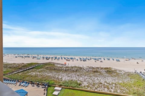 Take the private boardwalk over the dune and you're on the sand in under a minute. No crossing a road, no hunting for parking.