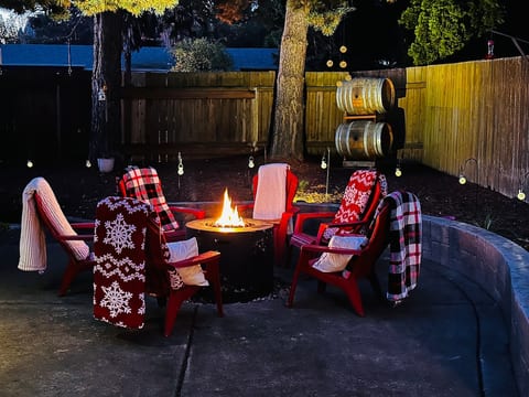 Firepit area• Seating for 6 • Landscape lighting • Wine barrels from Domaine Serene • Warm Blankets • Small white lights lace the firepit area • Landscape lighting brightens up the trees - Stunning!