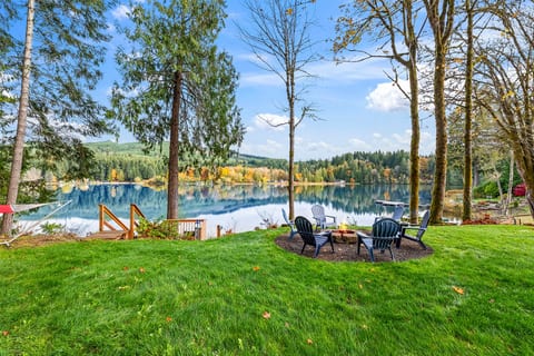 Mission Lake in fall — still water, fall color, and a fire waiting for you