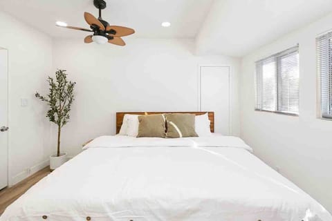 Master bedroom features a comfortable king bed and ensuite bathroom that come stocked with all the essentials. Plenty of closet space.