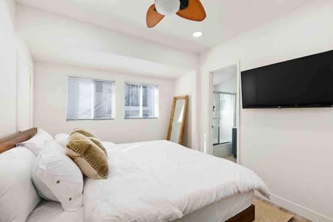 Master bedroom features a comfortable king bed and ensuite bathroom that come stocked with all the essentials. Plenty of closet space.