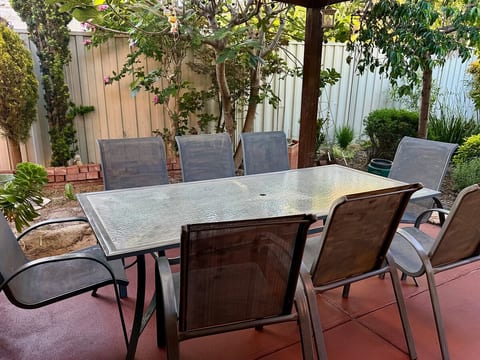 Outdoor dining table seats 8. Entertain a few of your own guests.