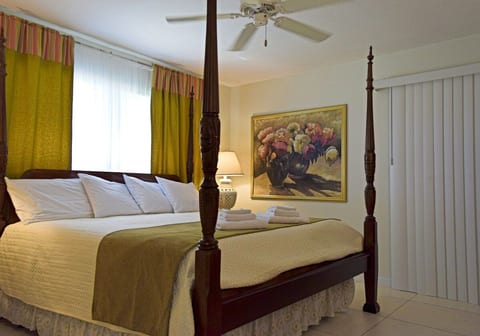King bed and floral painting