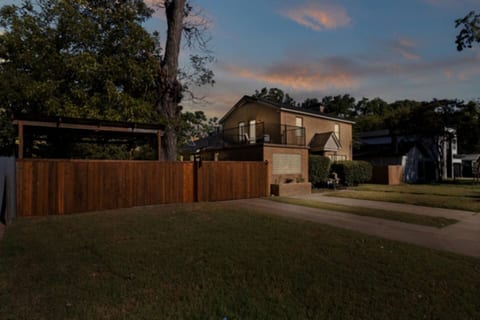“Historic Dallas home with fenced yard, balcony, and private parking.”