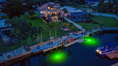 Welcome to Hernando Hideaway — a direct Gulf-access waterfront retreat with a heated saltwater pool, 45' private dock & underwater fishing lights.