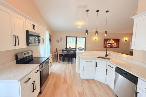 Kitchen with stove, oven, microwave and dishwasher