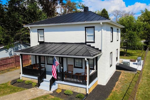 Classic 1939 two-story home with a covered front porch, right in Ranson