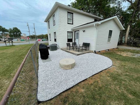 Backyard patio with smokeless gas fire pit and grill